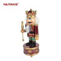 Mini wooden nutcraker with music box